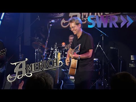 Videoclip de From A Moving Train — America