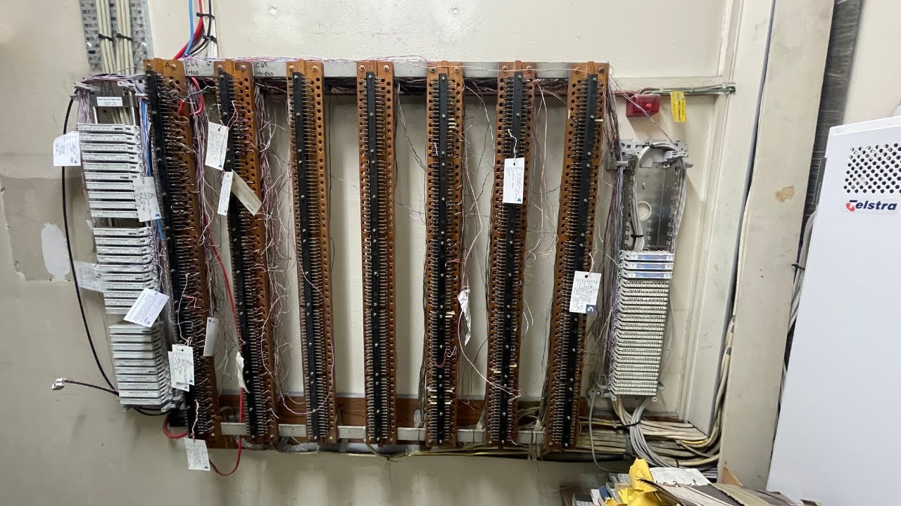 SECURE A COM technician performing IDF and MDF clean-up, maintenance, MDF jumpering, and full FTTB network setup for a Sydney business