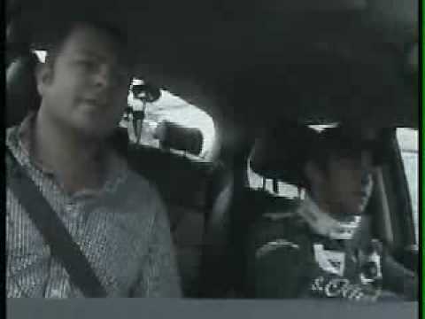 Formula 1 Driver Rolls Jaguar Roadcar