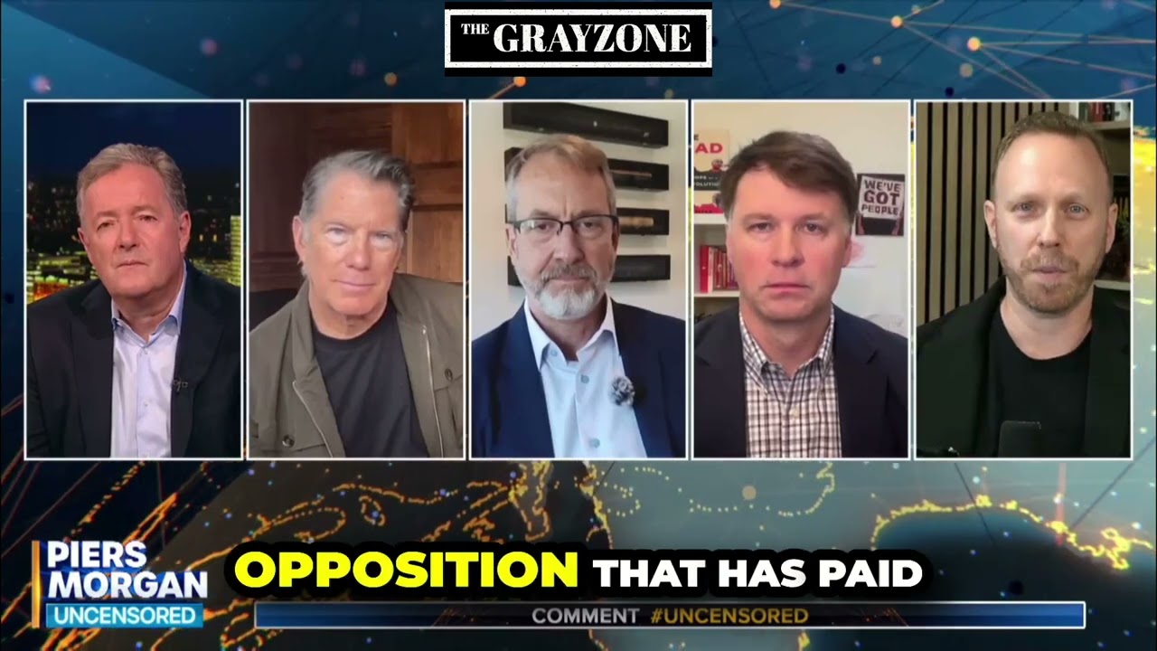 Max Blumenthal wipes smile off US official's face