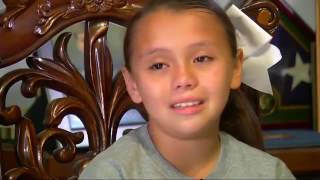 Teen saves tiny cheerleader from heartbreaking moment