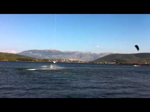 Unhooked back roll landing toeside with a surface pass