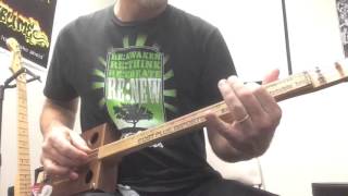 The Edge - 3 String Cigar Box Guitar w Yardstick Fingerboard