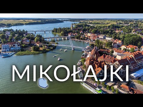 Mikołajki, leżące w sercu Szlaku Wielkich Jezior Mazurskich. Zobacz atrakcje Mikołajek
