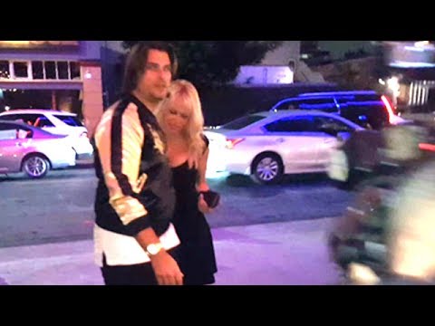 Pamela Anderson And A Mystery Man Enjoy A Night Out