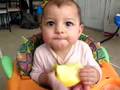 Ava Eating An Apple