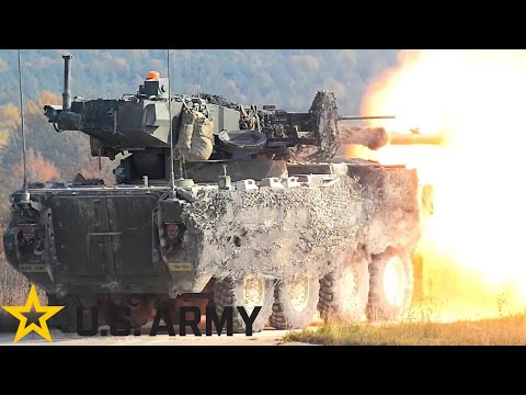 US Army, Firepower. Stryker M1128 MGS armored vehicle with tank gun in action.