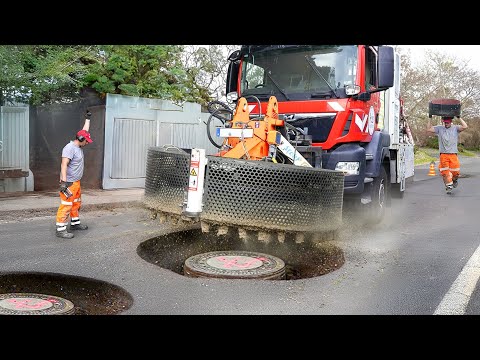 The Genius Truck That Repairs Giant Manholes in Germany