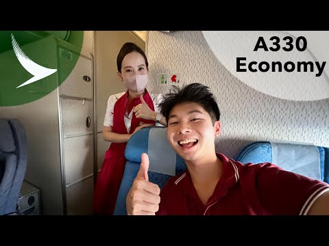 Cathay Pacific ECONOMY Class to Ho Chi Minh City + Layover Vlog