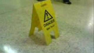 Possessed wet floor sign