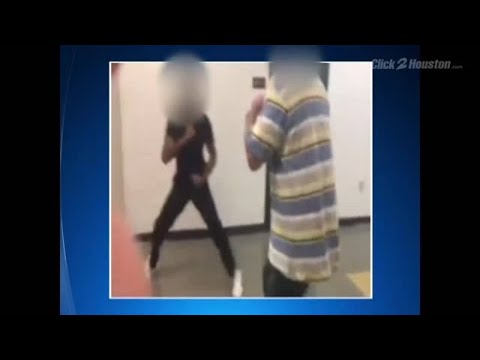 VIDEO: Teacher, student fight in school hallway