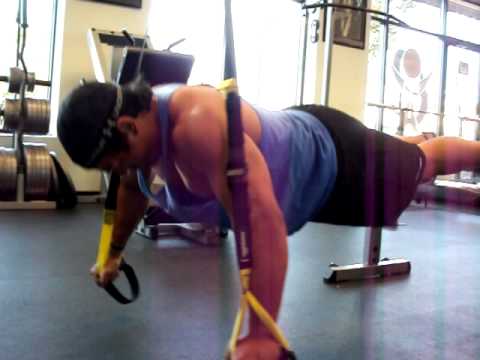 Suspended bodyweight chest fly