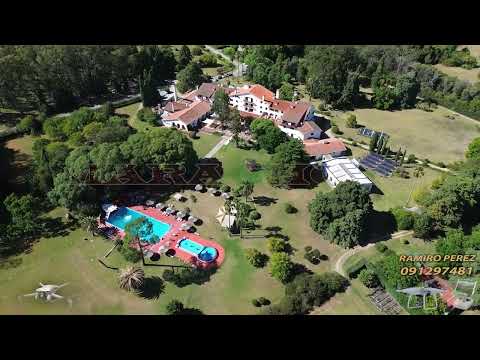 VIDEO DRON NUEVA HELVECIA COLONIA, RECORRIDA POR LA AVENIDA DE ACCESO Y VISTAS DEL HOTEL NIRVANA.