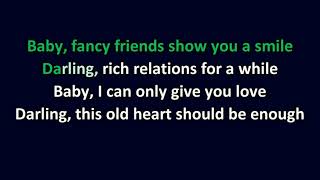 Elton John - Mama Can't Buy You Love
