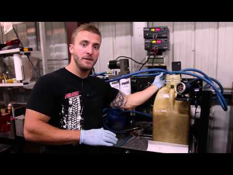 FASS Fuel Systems Performing Diagnostic 5 Gallon Bucket Test on a FASS Fuel System