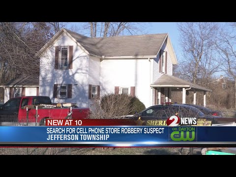 Search for cell phone store robbery suspect