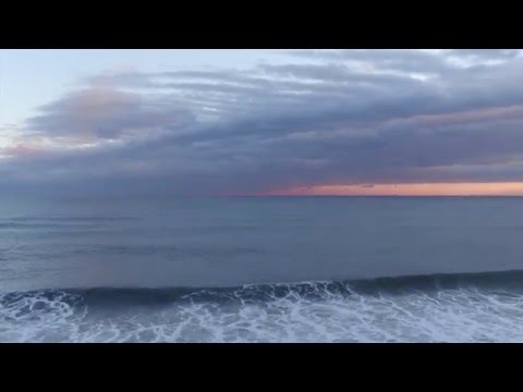 Imatges d'un drone d'aigües i posta de sol a Geòrgia a East Hampton