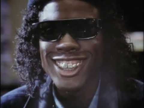 CB4 (1993) trailer frame with Chris Rock as MC Gusto on stage