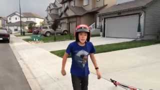 Psycho kid throws electric scooter