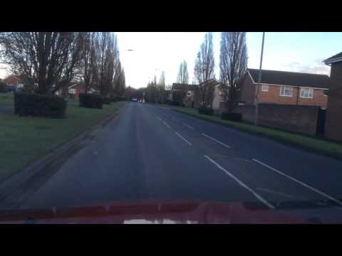 Demonstration of taking the Third Exit, Right, at a simple roundabout