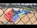 Maryland child dies after bounce house goes airborne onto baseball field