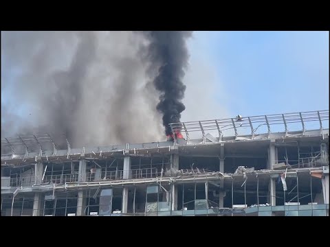 Video Thumbnail: Smoke rises from damaged buildings in Kyiv after Russian attacks | AFP