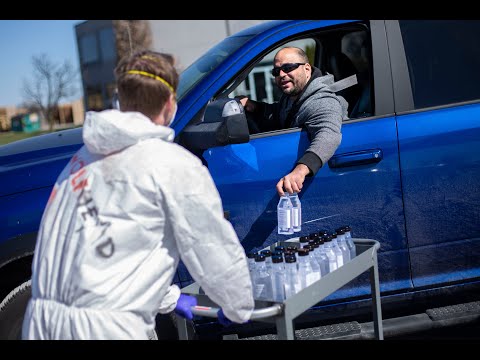 Wolfhead distributes hand sanitizer to the public