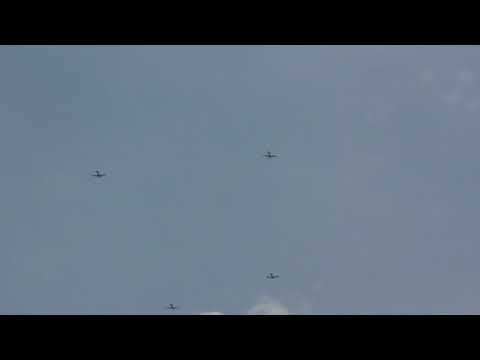 North American T6 A Texan Fleet? Mysterious Formation Flight. Any Idea Whose Planes These Are?