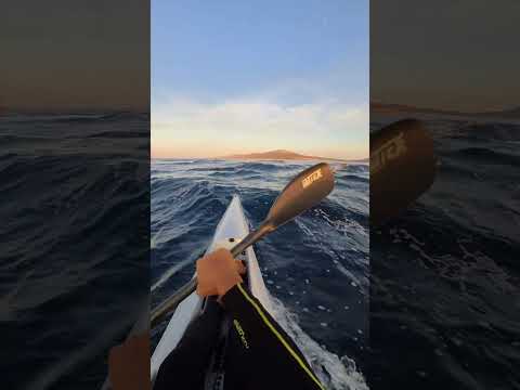 Early morning surfing at the tidal race in Tarifa.