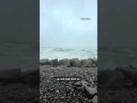 CNN Weather Meteorologist loses hat playing catch in the nor'easter