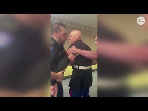 Marine gets arm broken amid Iran war protest as police, Senator Tim Sheehy eject him from hearing