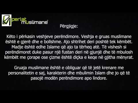 Fustani deri tek gjunjët, pantallona nën të dhe çizme të gjata