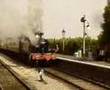 GWR 5553 Leaves Williton Station With A Passenger Train