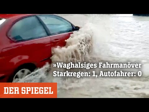 Waghalsiges Fahrmanöver: Starkregen: 1, Autofahrer: 0 | DER SPIEGEL