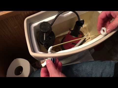Part of a video titled How To Replace A Toilet Flush Lever (Handle) - YouTube
