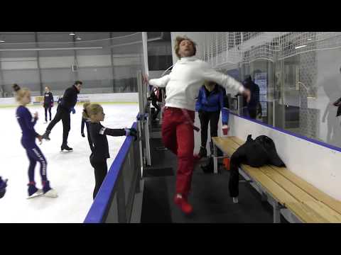 Evgeni Plushenko with his group of athletes, training spins
