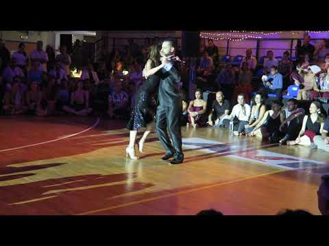  Javier Rodriguez  and  Moira Castellano  are  dancing  to  the  tango  "  Dime Mi Amor  "  by  Juan D'Arienzo  at  A los amigos tango festival  in  2019