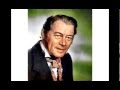 "Talk to the Animals" sung by Rex Harrison