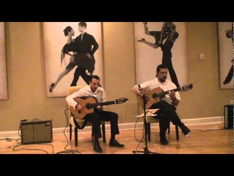 Two guitars. Russian-Romani (Gypsy) style. Via Romen Guitar Duo.