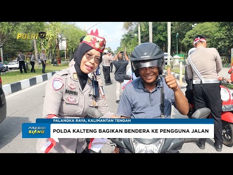 DITLANTAS POLDA KALTENG BAGIKAN 1.000 BENDERA MERAH PUTIH KEPADA MASYARAKAT