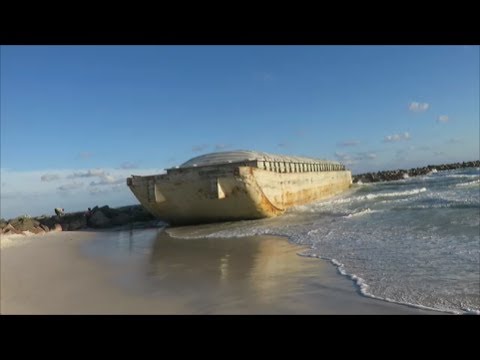 Barge Washes Ashore at St Andrews State Park, Panama City Beach FL May 24 2017