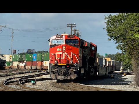 CN 3147 100th Unit Tier 4 leads evening intermodal out of Markham yard