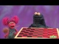 Sesame Street Cookie Monster Plays Eats Checkers