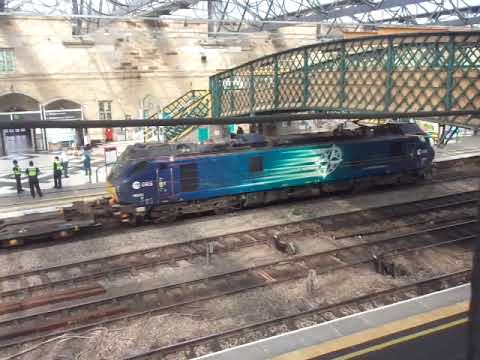 The Class 88 DRS No.88003 'Genesis' with Rail Containers was passing at Carlisle Citadel Station.