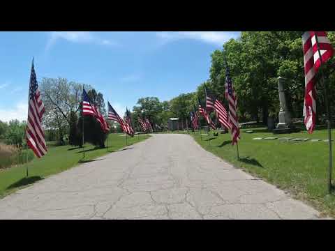 Rosehill drive festooned with 165 USA flags at Rosehill Cemetery