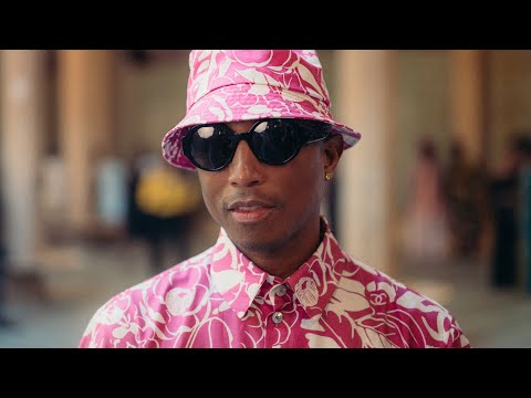 Pharrell Williams with Caroline de Maigret at the 2022/23 Métiers d'art CHANEL – DAKAR show