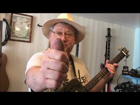 4 string Resonator Cigar Box Guitar played by Dogleg Steve