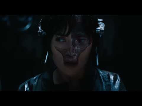 Trailer shot of the shelling sequence: mechanical petals closing around the Major