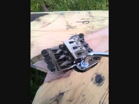 Cigar box style guitar with floyd rose tremolo