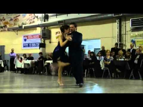 Paola Tacchetti  and  Ernesto Candal  are  dancing  to  the  vals  "  Pedacito De Cielo  "